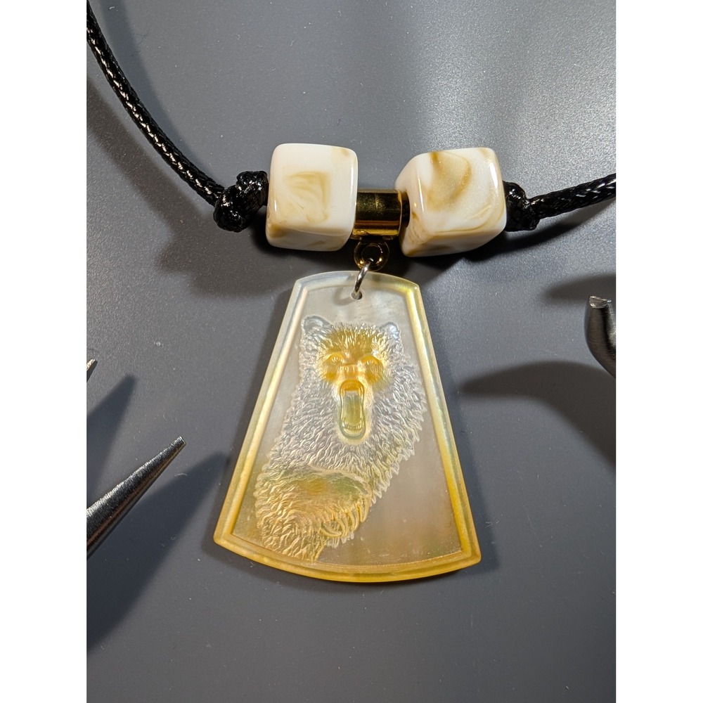 Carved Mother of Pearl Bear Pendant Necklace Adjustable Black Cord Cream Beads